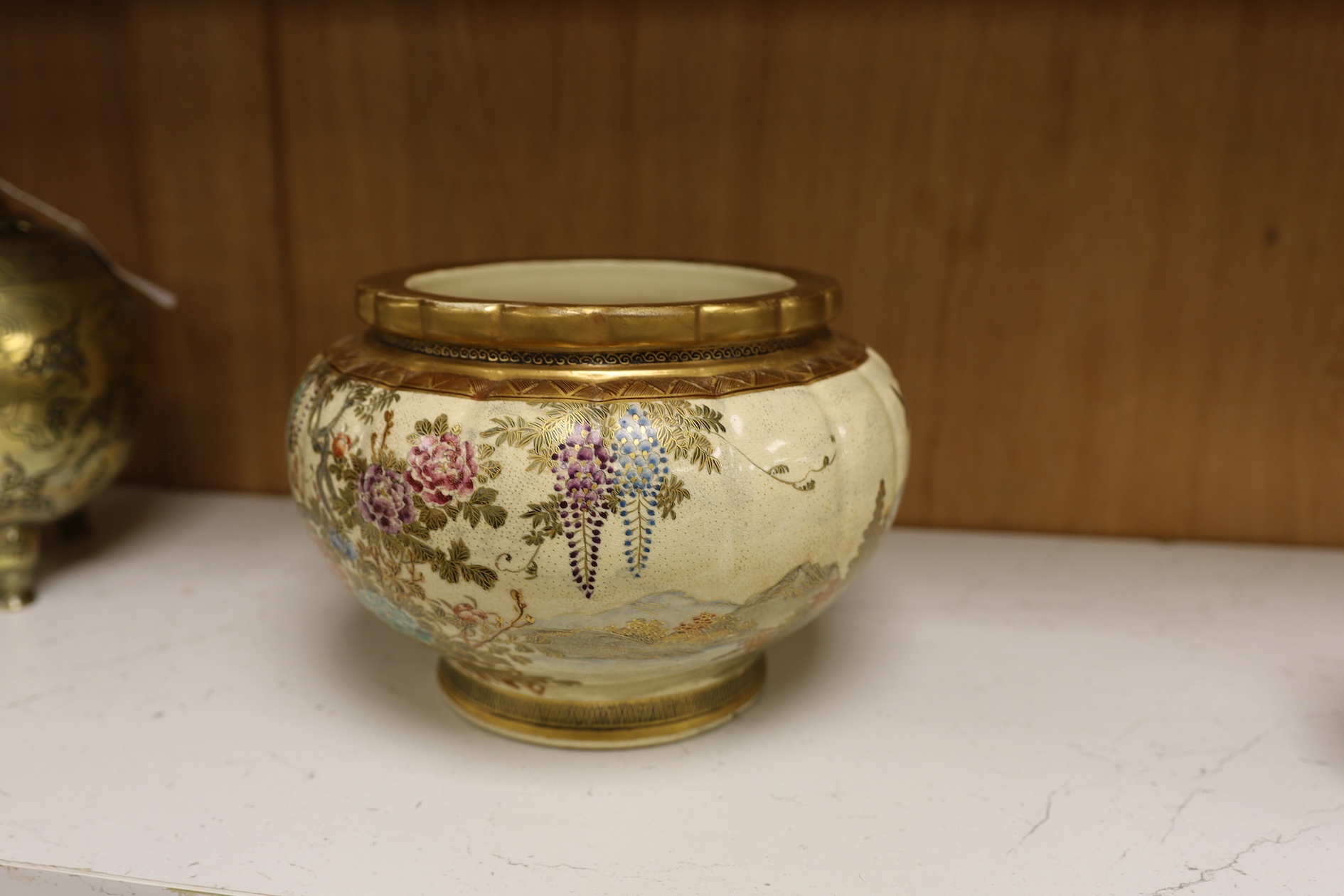 A Japanese Satsuma large bowl, 15cm high. Condition - heavily stain inside some grazing to lower rim and gilt scuffed on top rim of bowl